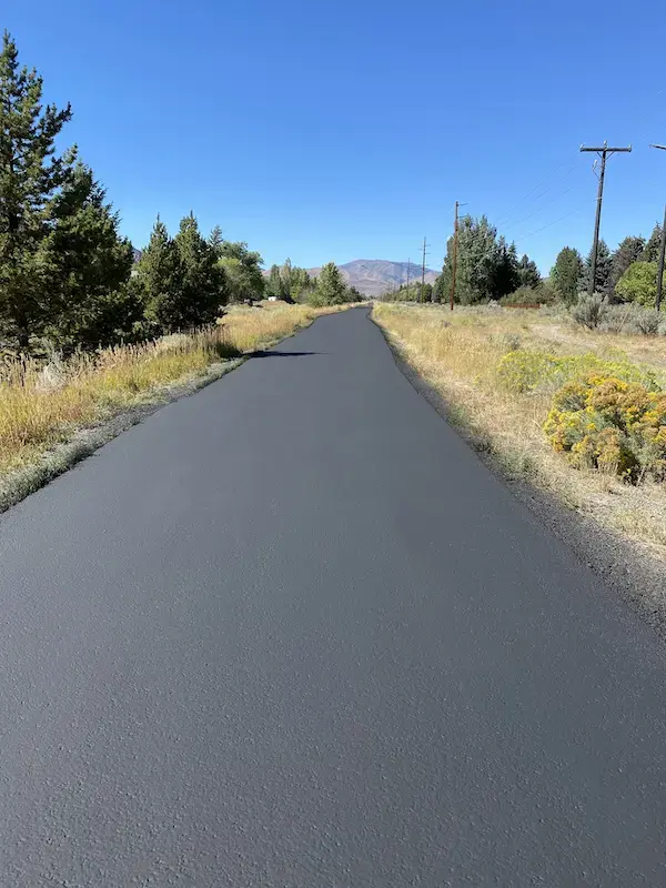 Freshly sealed bike path in the mountains.