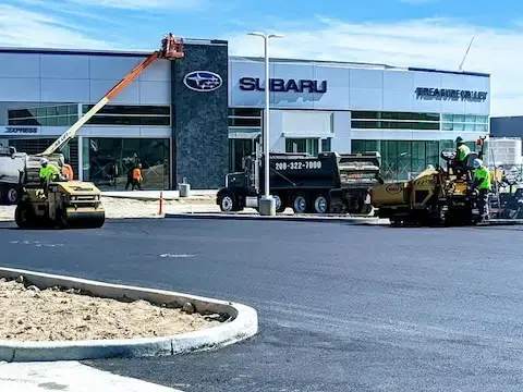 PSI crew paving a parking lot.