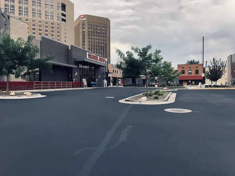 Freshly sealed parking lot.