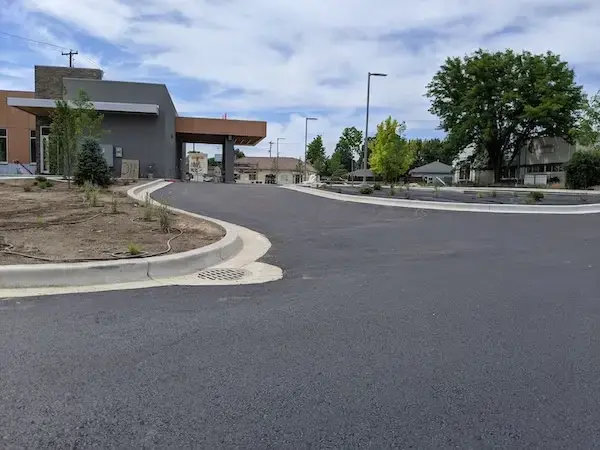 Freshly paved bank parking lot.